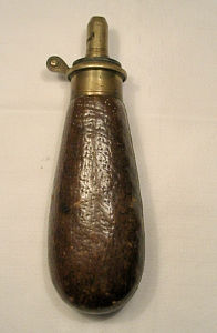 Click to enlarge a leather covered bag shaped powder flask by Sykes for a pistol or possibly a rook rifle