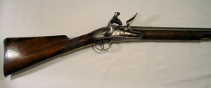 Click to enlarge an officer’s flintlock fusil with 32 in. barrel