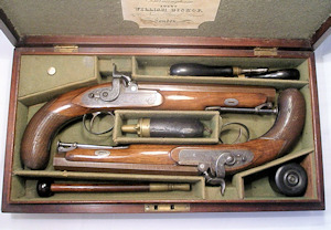 Click to enlarge a fine cased pair of 15 bore officer’s percussion pistols by Westley Richards