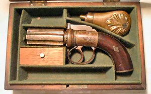 Click to enlarge a cased 120 bore six shot pepperbox revolver by Boston of Wakefield