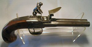 Click to enlarge a 54 bore double barrelled side by side boxlock flintlock pistol by J. & W. Richards